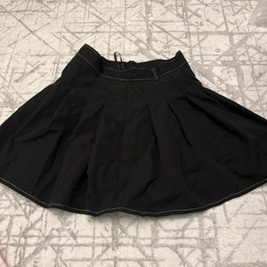 black pleated skirt